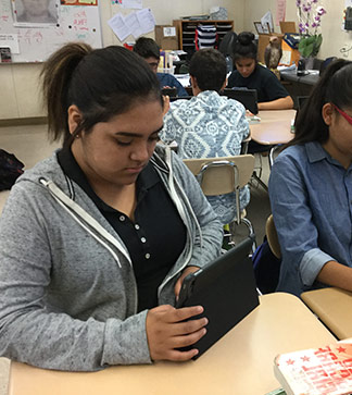 Students use tablets in class